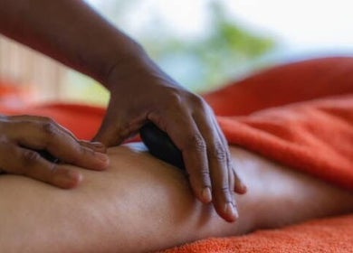 Relaxing hot stone massage at Mother City Mobile Massage, Cape Town, Western Cape, ZA.
