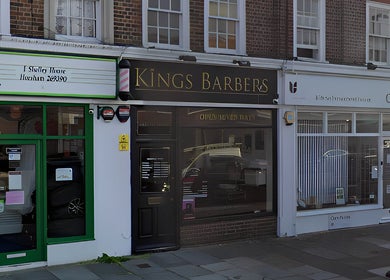 Front entrance of Kings Barbers in Horsham, England, GB, showcasing modern design and inviting atmosphere.