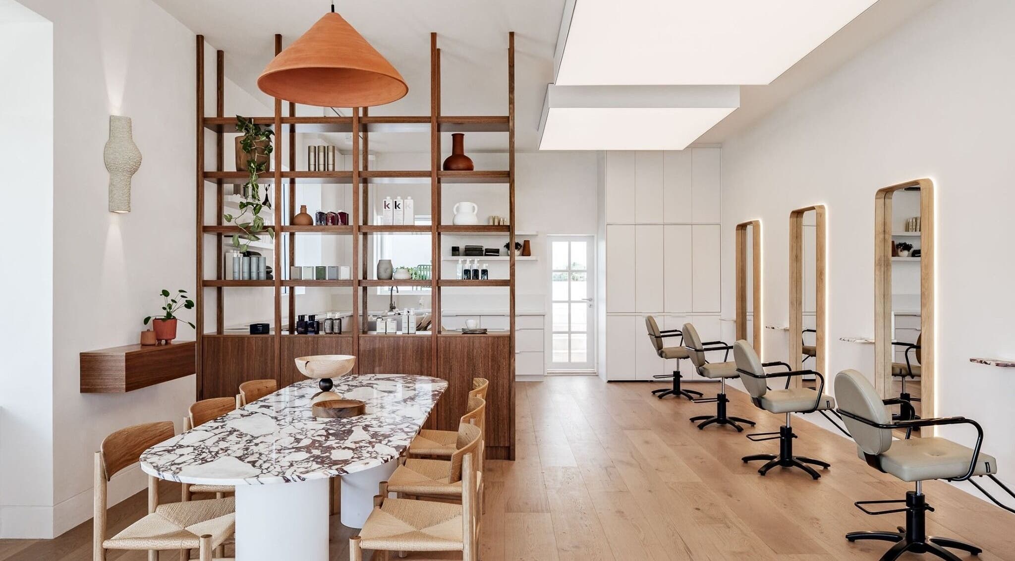 Interior of Salon Kaia in Wollongong, NSW, AU, featuring stylish seating and modern decor.