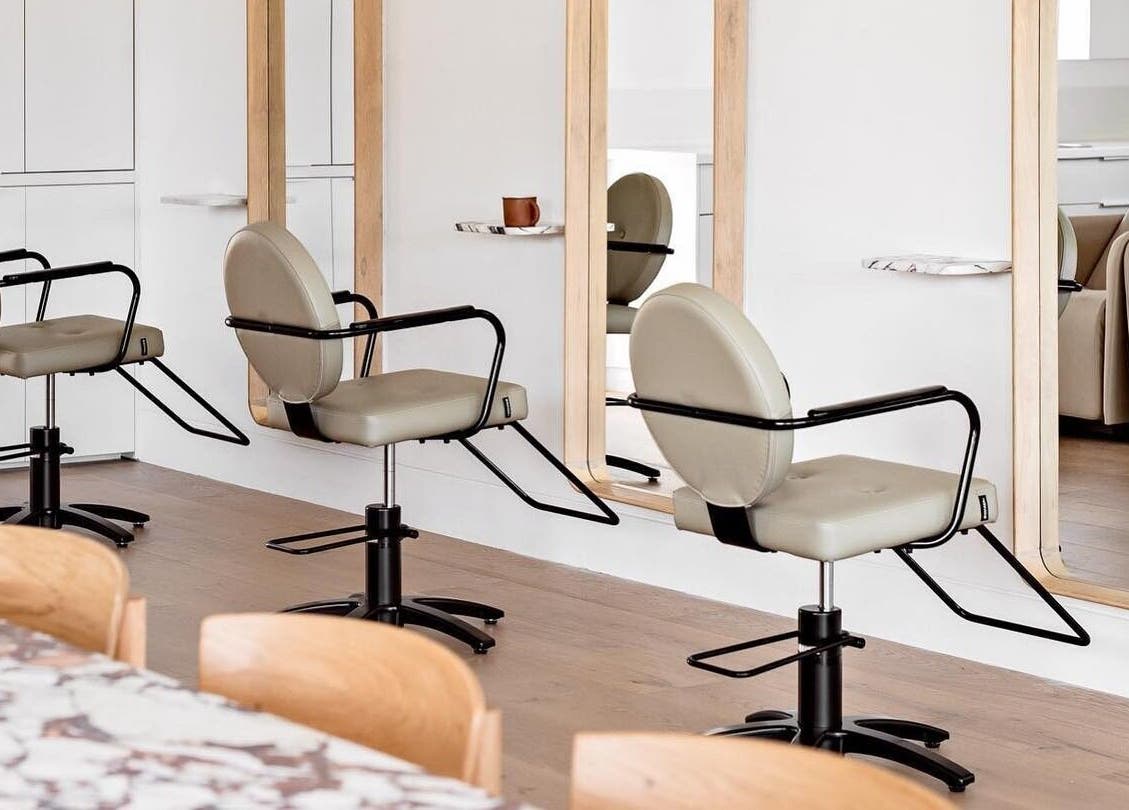 Chic salon chairs and mirrors at Salon Kaia, Wollongong, NSW, AU, exuding modern elegance.
