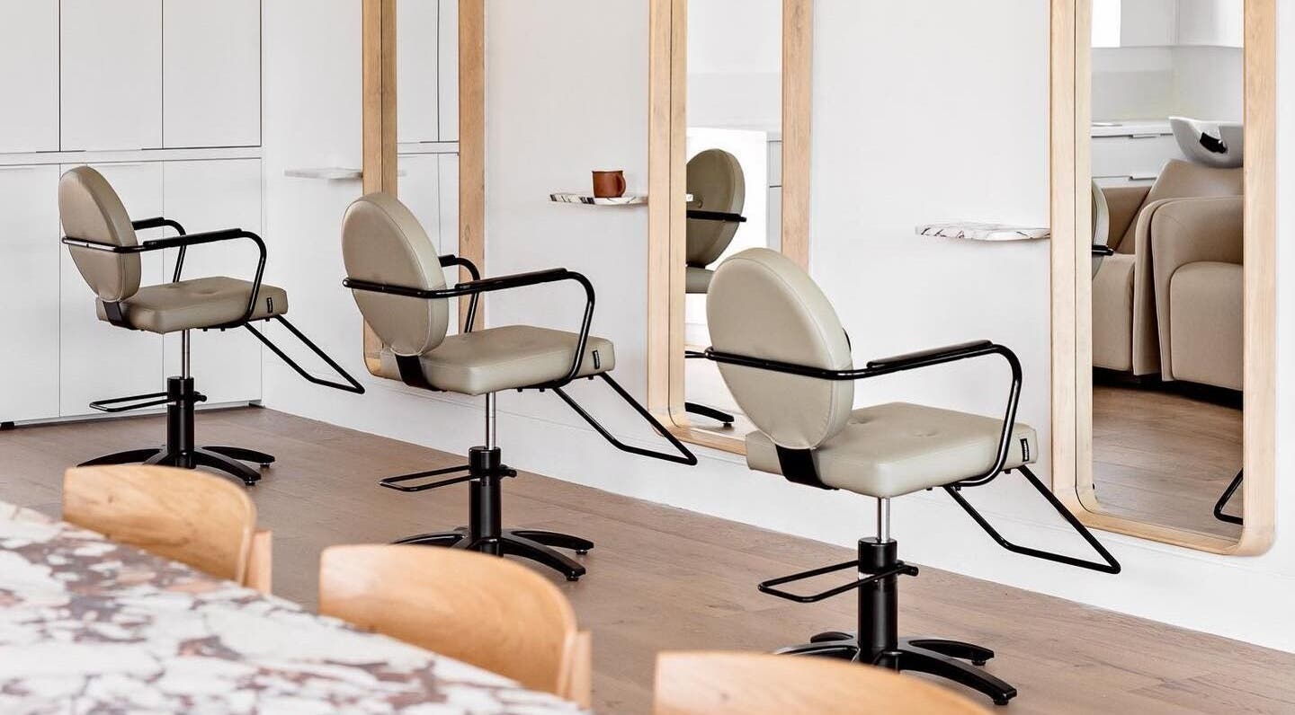 Chic salon chairs and mirrors at Salon Kaia, Wollongong, NSW, AU, exuding modern elegance.