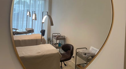 Reflection of a serene treatment room at The Oasis Cosmetic Tattoo Malvern, Melbourne, Victoria, AU.