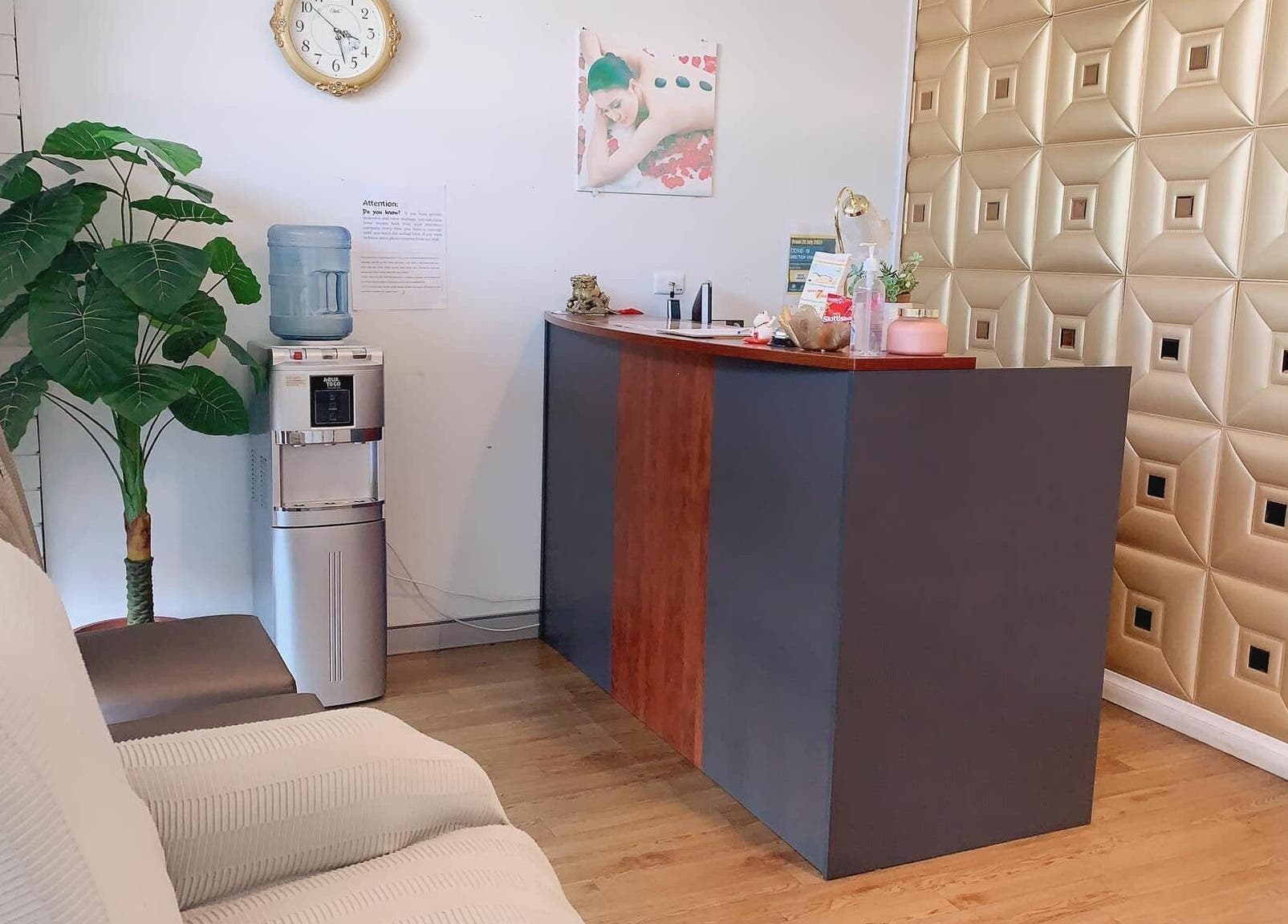 Reception area at Findon Massage in Findon, South Australia, AU, featuring modern decor and comfortable seating.