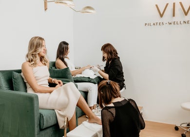 Women enjoying manicure and pedicure at Viva, a wellness venue in Singapore, SG.