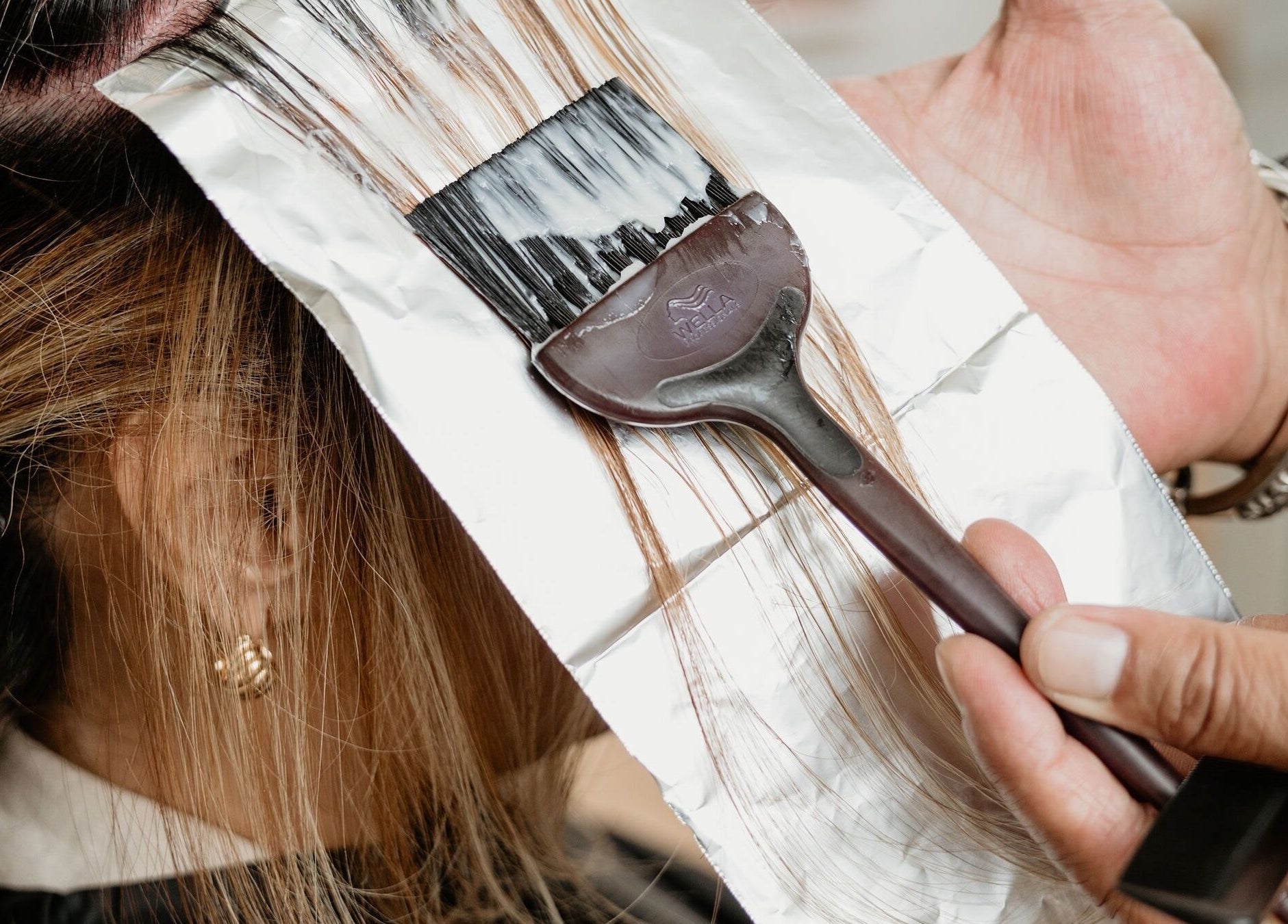 Close-up of professional hair coloring at Viva salon, Singapore, SG.