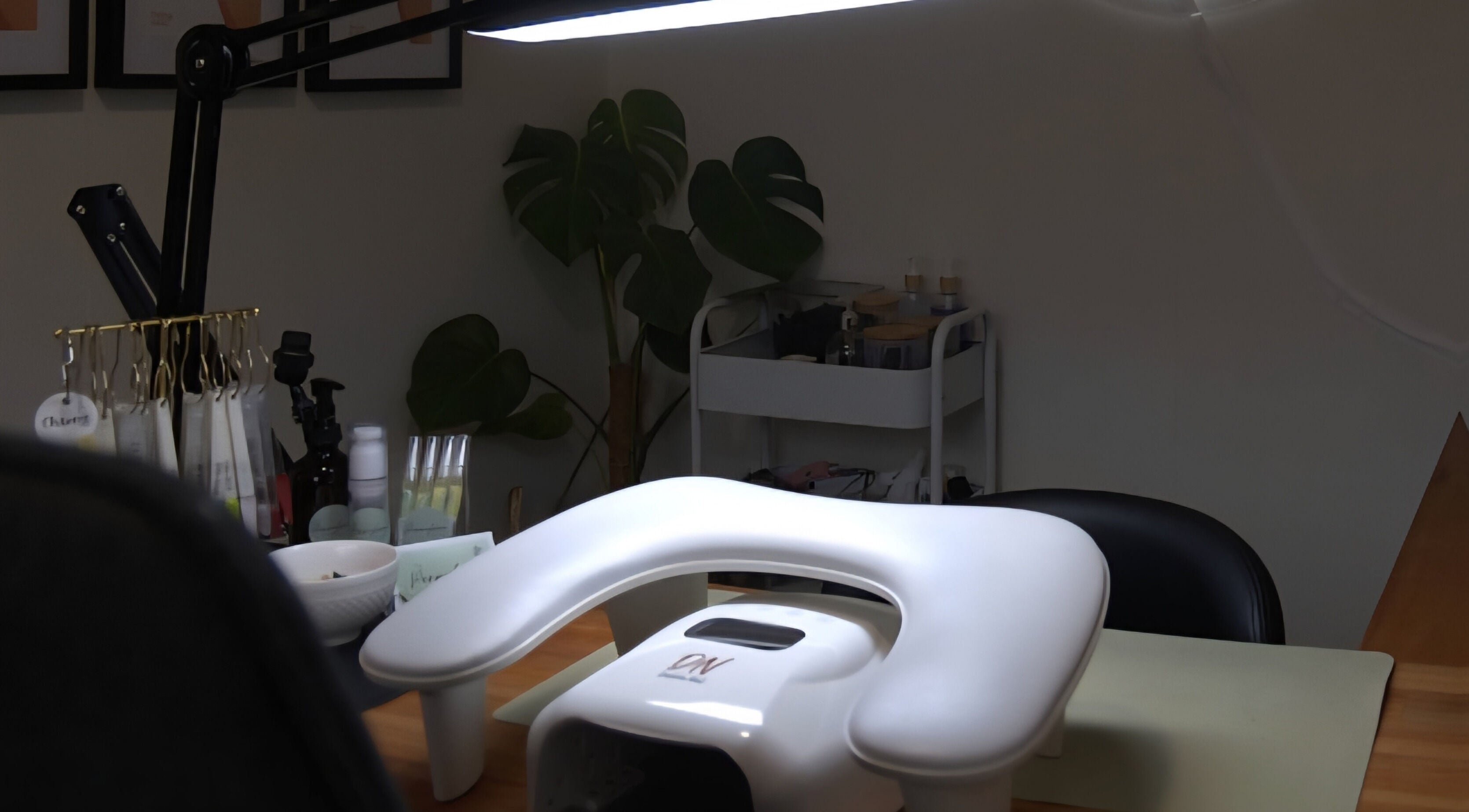 Nail station at PennyLane Beauty Co., Greymouth, West Coast, NZ with tools and modern decor.