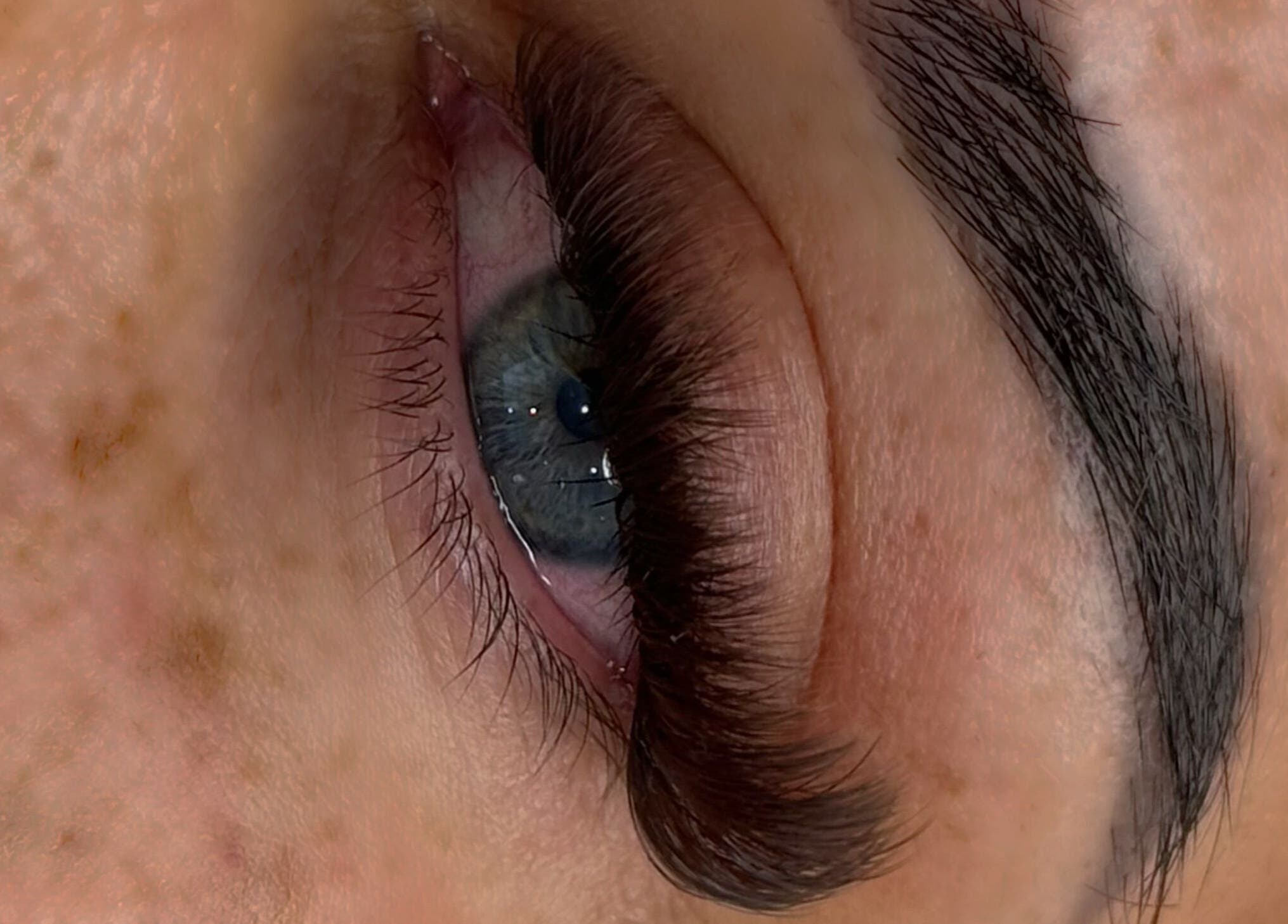 Close-up of eye with eyelash extensions by Angel Eyes by Sumaya in Bournemouth, England, GB.