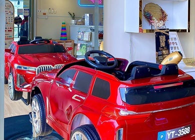 Red children's salon chair at Mayssa Salon (Cyberjaya), Cyberjaya, Selangor, MY resembling a car.