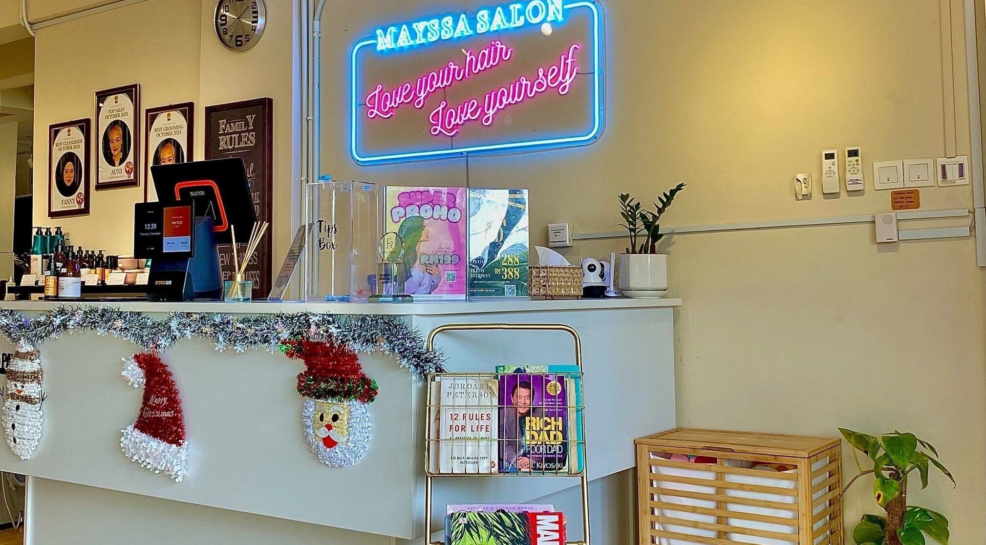 Reception area at Mayssa Salon (Cyberjaya), showcasing neon sign and decor; location at Cyberjaya, Selangor, MY.