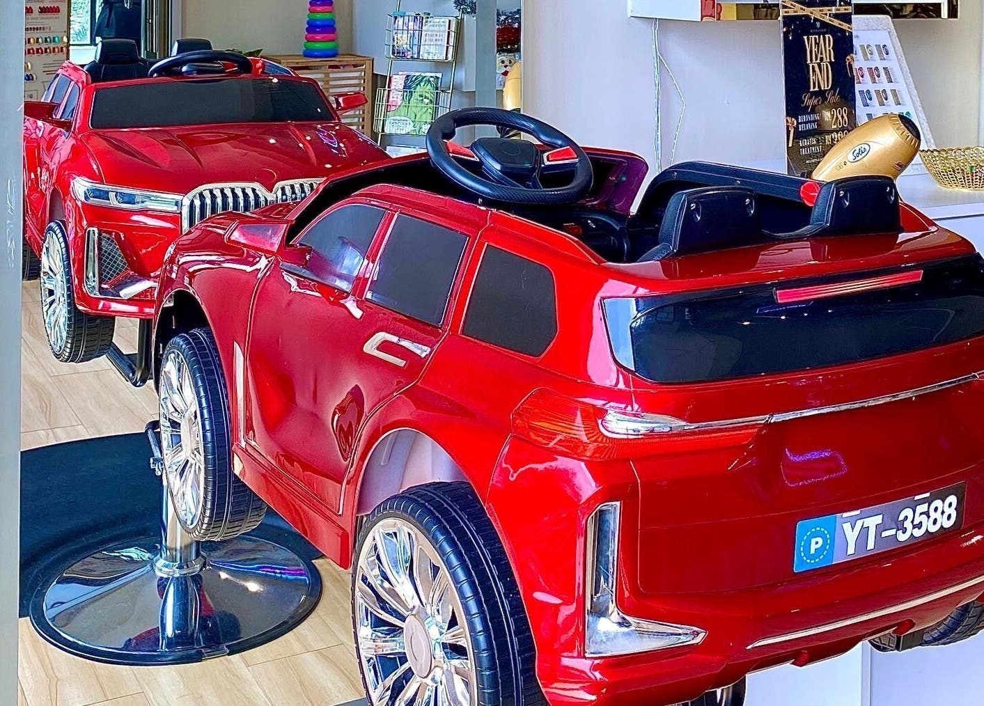 A vibrant kids' car seat at Mayssa Salon (Cyberjaya), Cyberjaya, Selangor, MY, offering a playful salon experience.