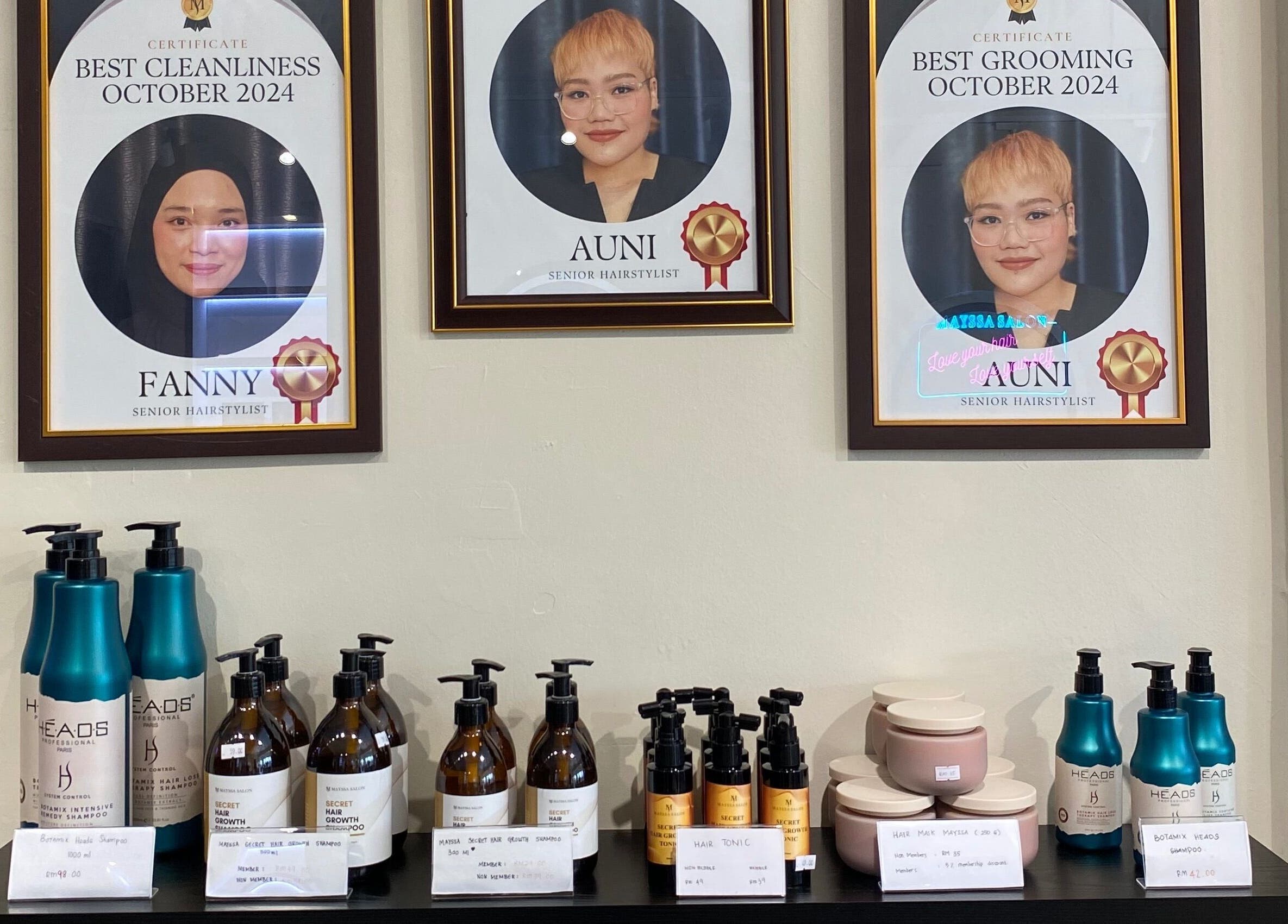 Award certificates and hair products at Mayssa Salon (Cyberjaya), Cyberjaya, Selangor, MY.