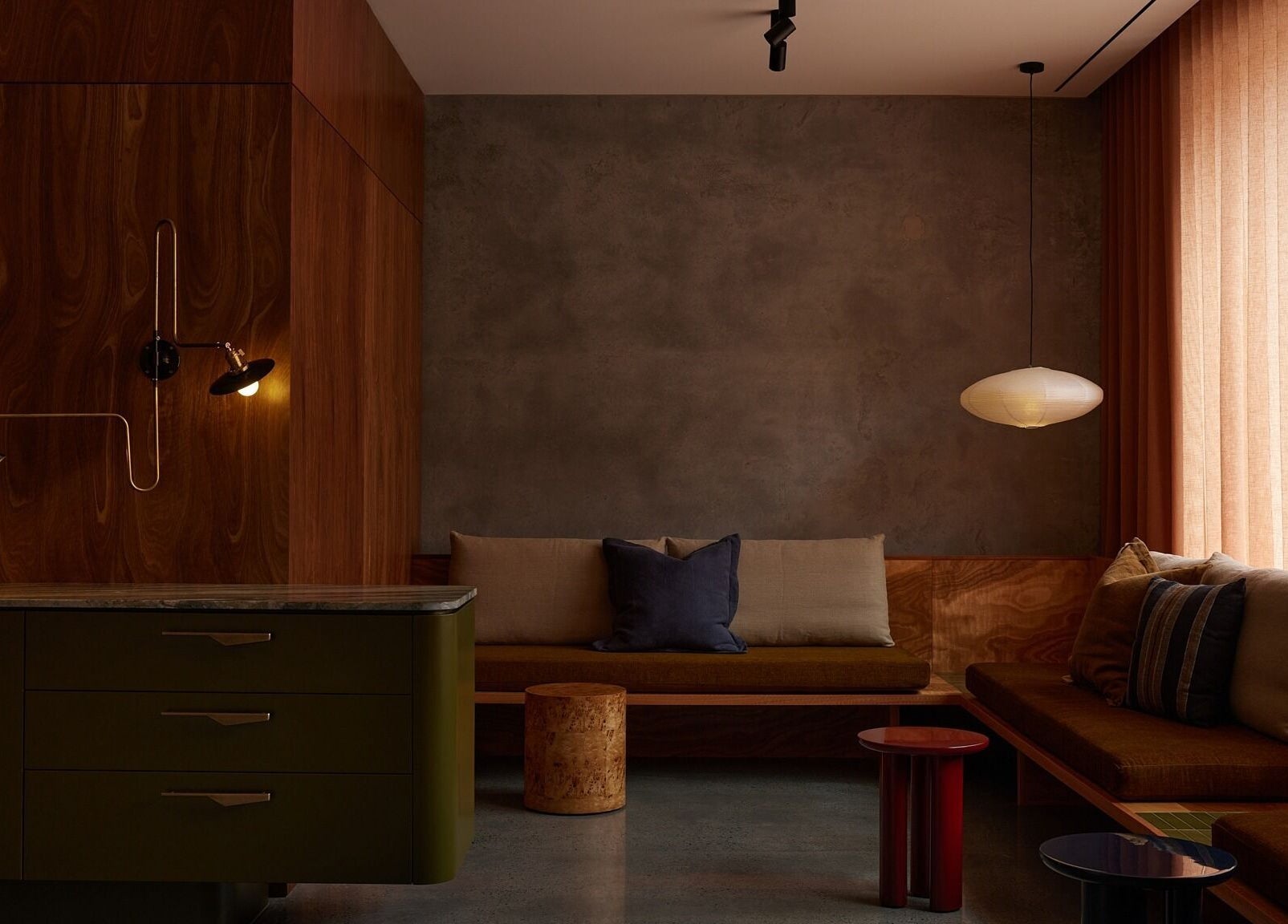 Elegant lounge at Comma Byron Bay with warm lighting in Byron Bay, New South Wales, AU.