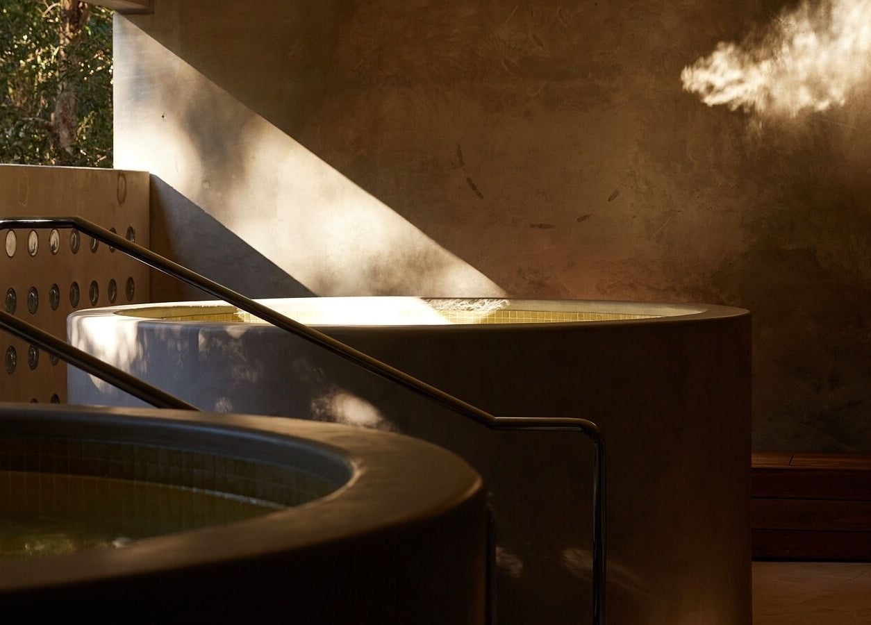Elegant spa tubs at Comma Byron Bay, capturing tranquil ambiance in Byron Bay, New South Wales, AU.