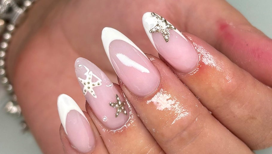 Elegant star-adorned nails at Beauty by Mollie, Burnley, England, GB. Perfect for stylish manicures.