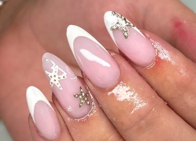 Elegant star-adorned nails at Beauty by Mollie, Burnley, England, GB. Perfect for stylish manicures.