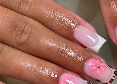 Beautiful French manicure with pink floral design at Beauty by Mollie, Burnley, England, GB.