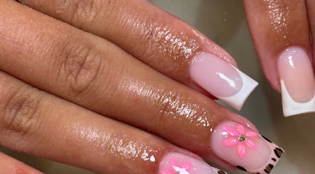 Beautiful French manicure with pink floral design at Beauty by Mollie, Burnley, England, GB.