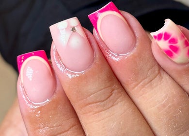 Elegant pink nail design at Beauty by Mollie, Burnley, England, GB showcasing vibrant nail art.