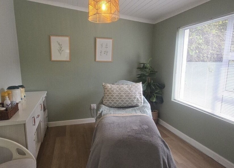 Cozy treatment room at Beauty by Kristy in Gqeberha, Eastern Cape, ZA. Bright decor and relaxing ambiance.