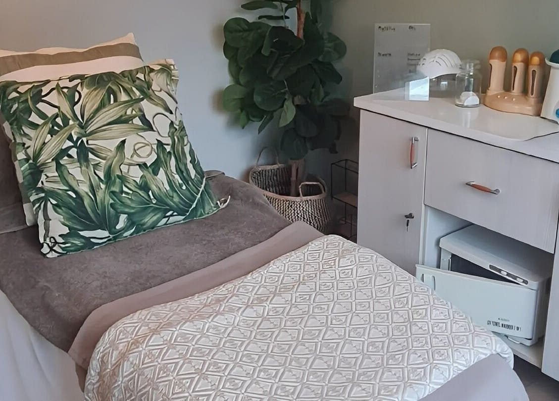 Cozy treatment room at Beauty by Kristy in Gqeberha, Eastern Cape, ZA, featuring a plush bed and soothing decor.