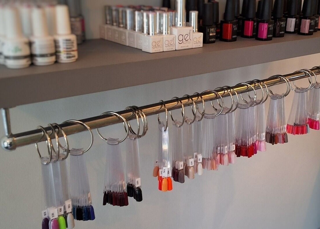 Nail polish collection at Beauty by Kristy in Gqeberha, Eastern Cape, ZA showcasing vibrant colors.
