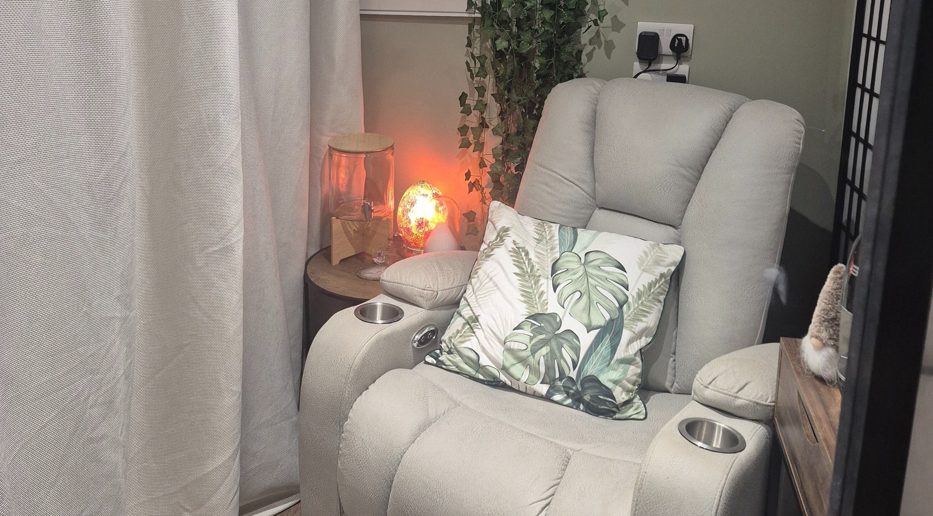 Relaxing massage chair at Liuda’s Massage and Beauty in Alexandria, Scotland, GB, offering comfort with elegant decor.