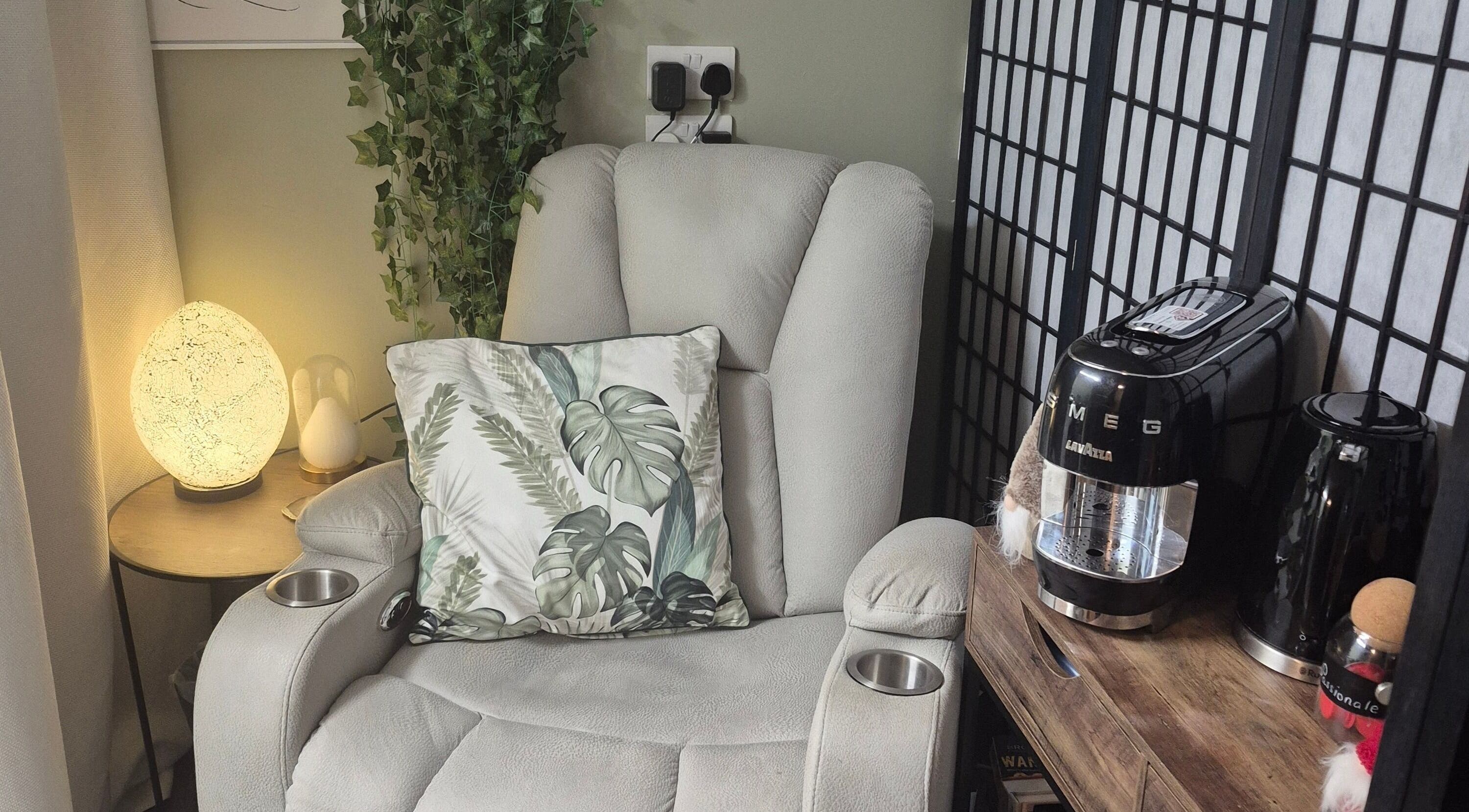 Cozy massage chair with tropical pillow in Liuda’s Massage and Beauty, Alexandria, Scotland, GB.