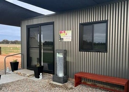 Entrance of Kylah Massage - Rochester Clinic in Diggora, Victoria, AU featuring modern design and outdoor decor.