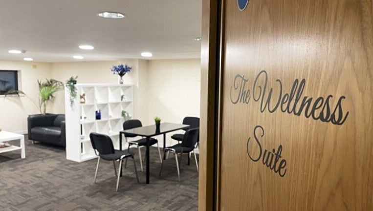 Cozy wellness suite at Advanced Aesthetics Clinic Ltd - Tiptree, Tiptree, England, GB with table and chairs.
