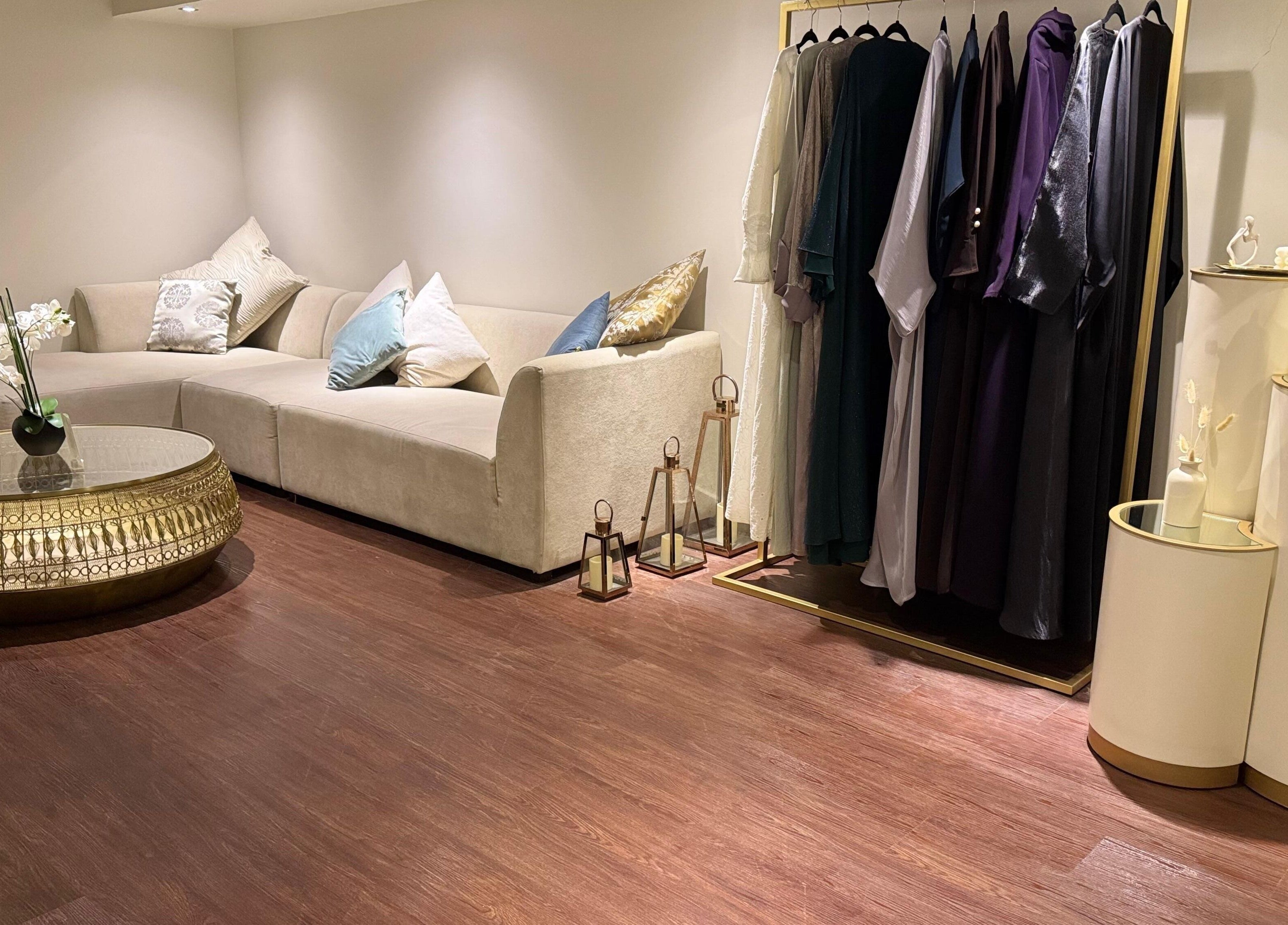 Relaxing corner with sofa and dresses at Abreez Beauty Salon, Sharjah, Sharjah, AE.