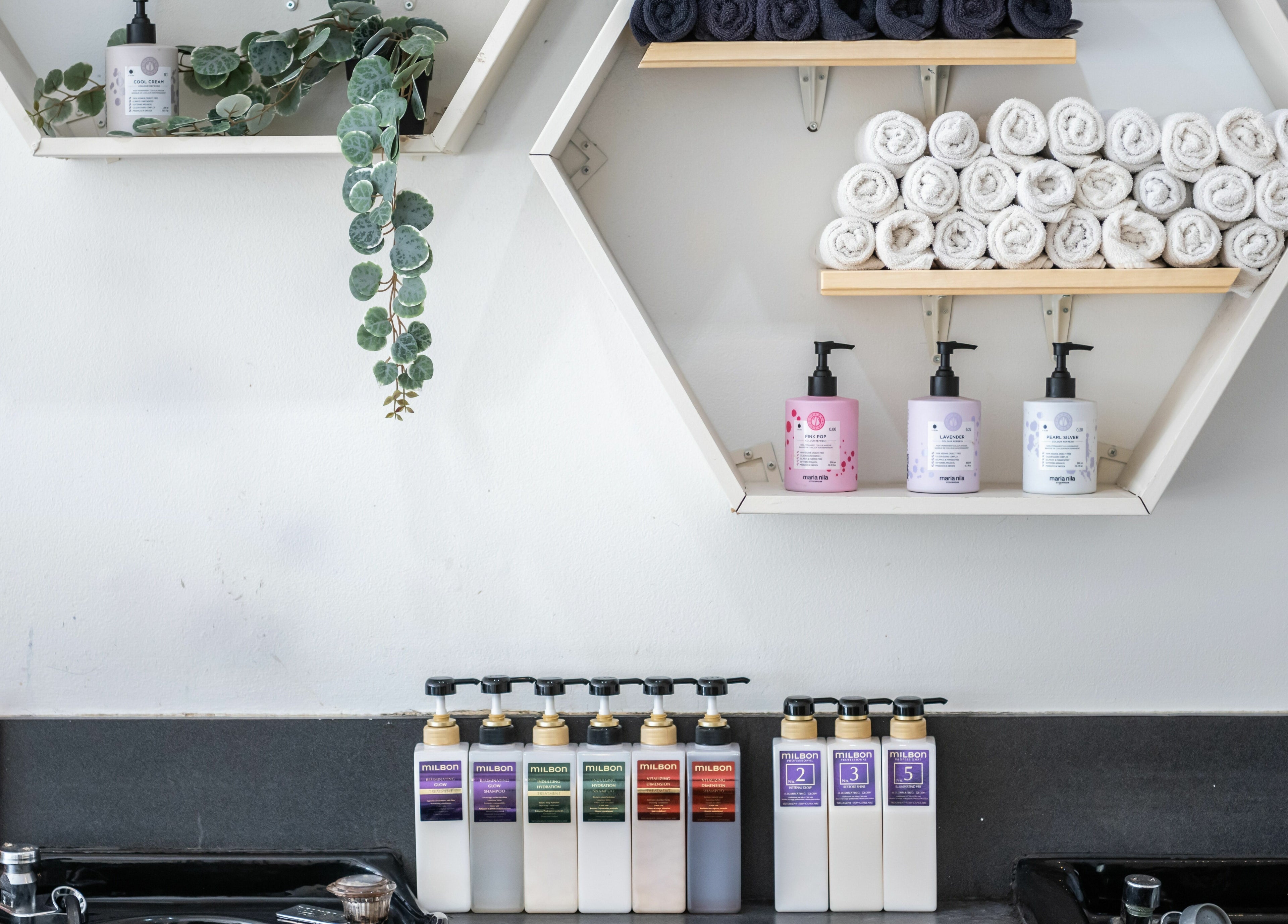 Hive Hair Spa at Oak's sleek shelf with products in Vancouver, British Columbia, CA.