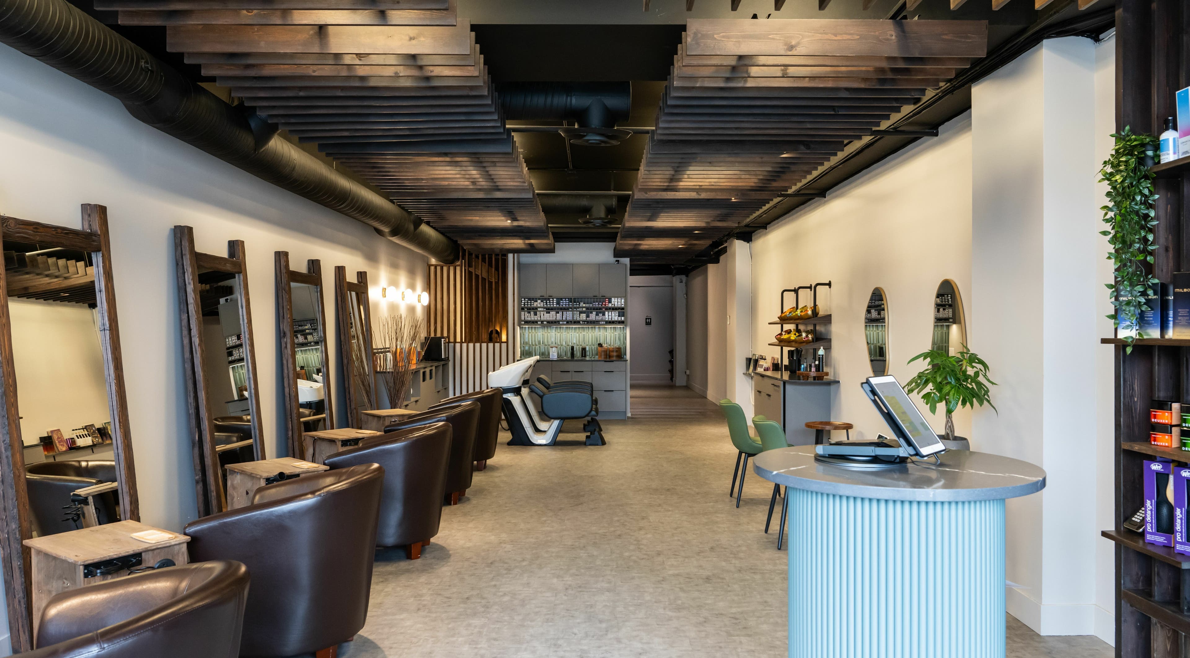 Modern interior of Hive Hair Spa | Broadway in Vancouver, British Columbia, CA, showcasing sleek design elements.