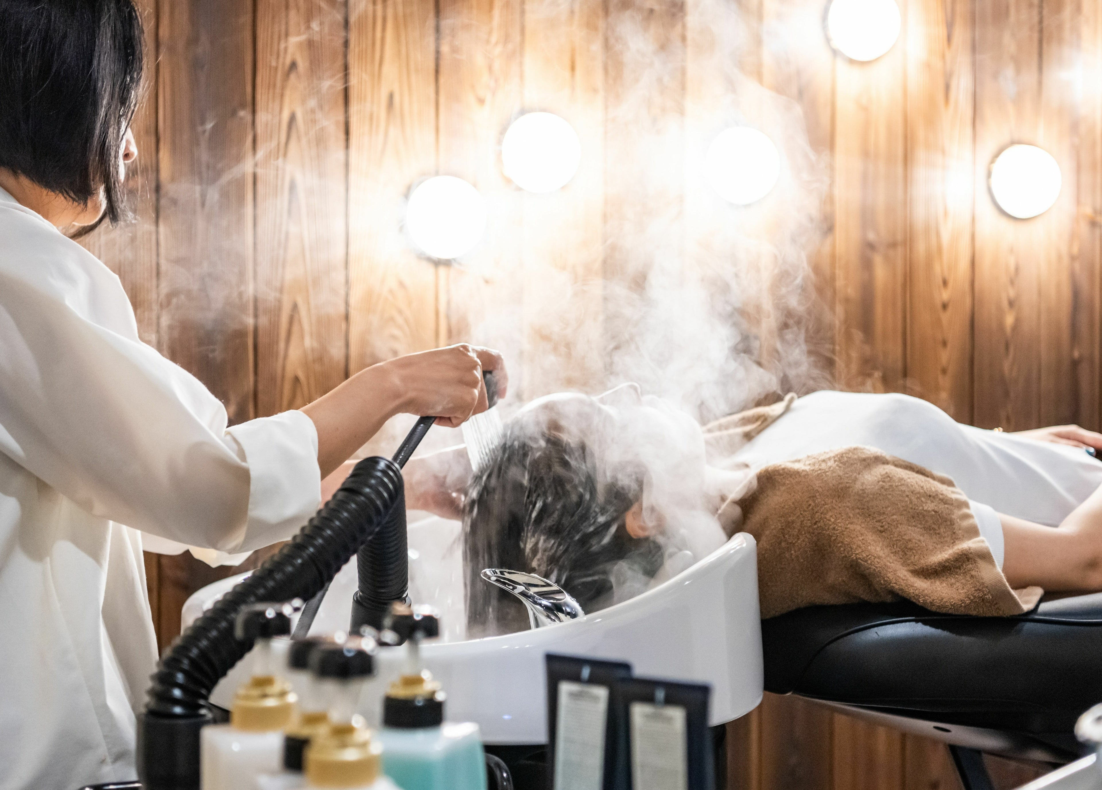 Luxurious hair treatment in progress at Hive Hair Spa | Broadway, Vancouver, British Columbia, CA.