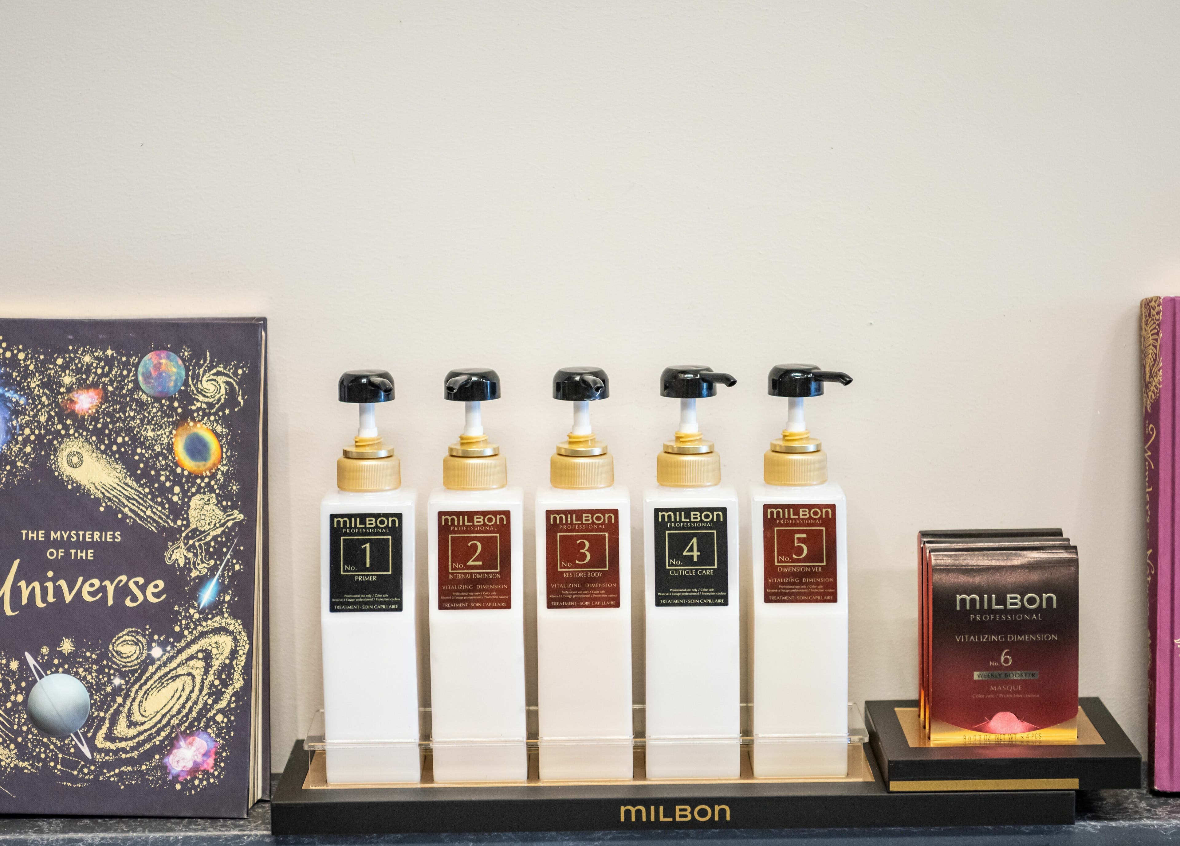 Milbon products on display at Hive Hair Spa | Broadway, Vancouver, British Columbia, CA.