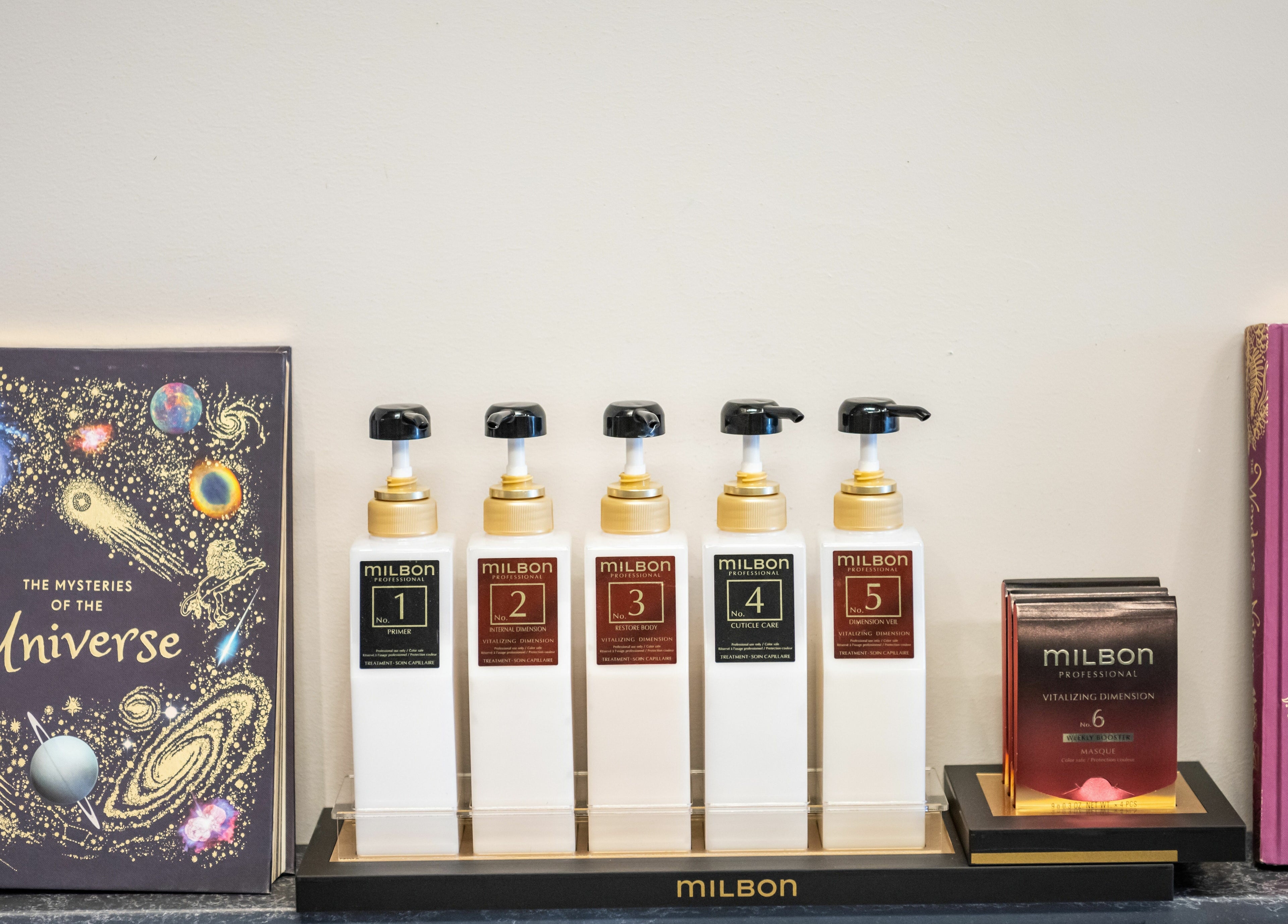 Milbon products on display at Hive Hair Spa | Broadway, Vancouver, British Columbia, CA.