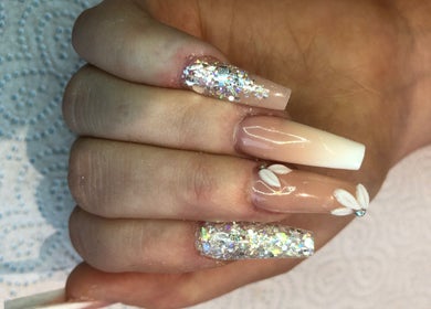 Sparkling nail art design at Gorjess Beauty, Accrington, England, GB showcasing glamour and style.