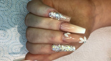 Sparkling nail art design at Gorjess Beauty, Accrington, England, GB showcasing glamour and style.