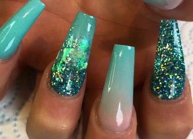 Sparkling aqua and glitter nail art at Gorjess Beauty, Accrington, England, GB.