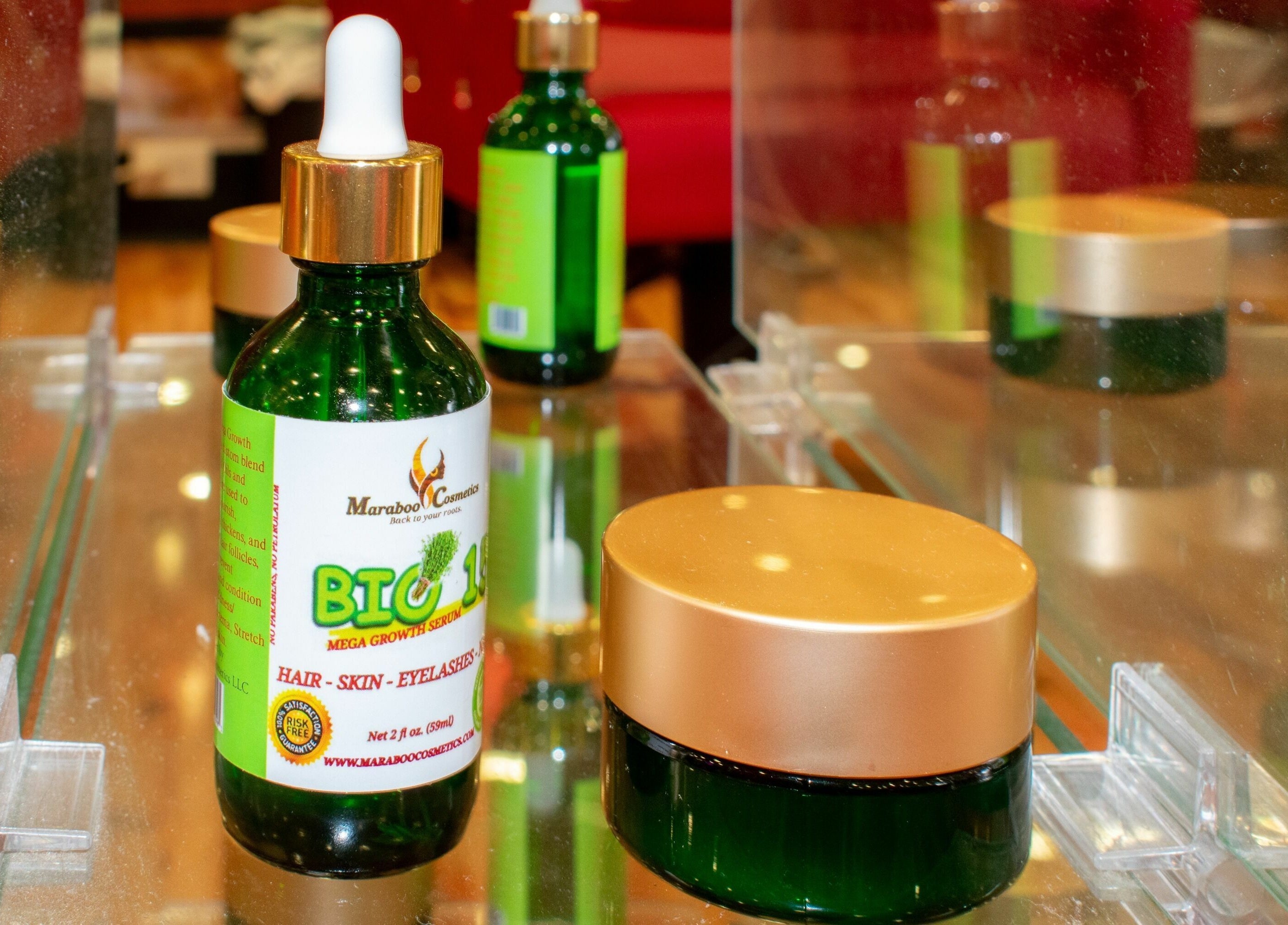 NADEGE CREATION - RANDOLPH showcases glass serum bottles in Randolph, Massachusetts, US, enhancing beauty care.