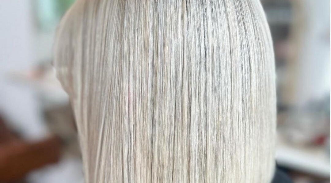 Sleek platinum blonde hair styled at Pure Styling by Kerry Slee in Toowoomba city, Queensland, AU.