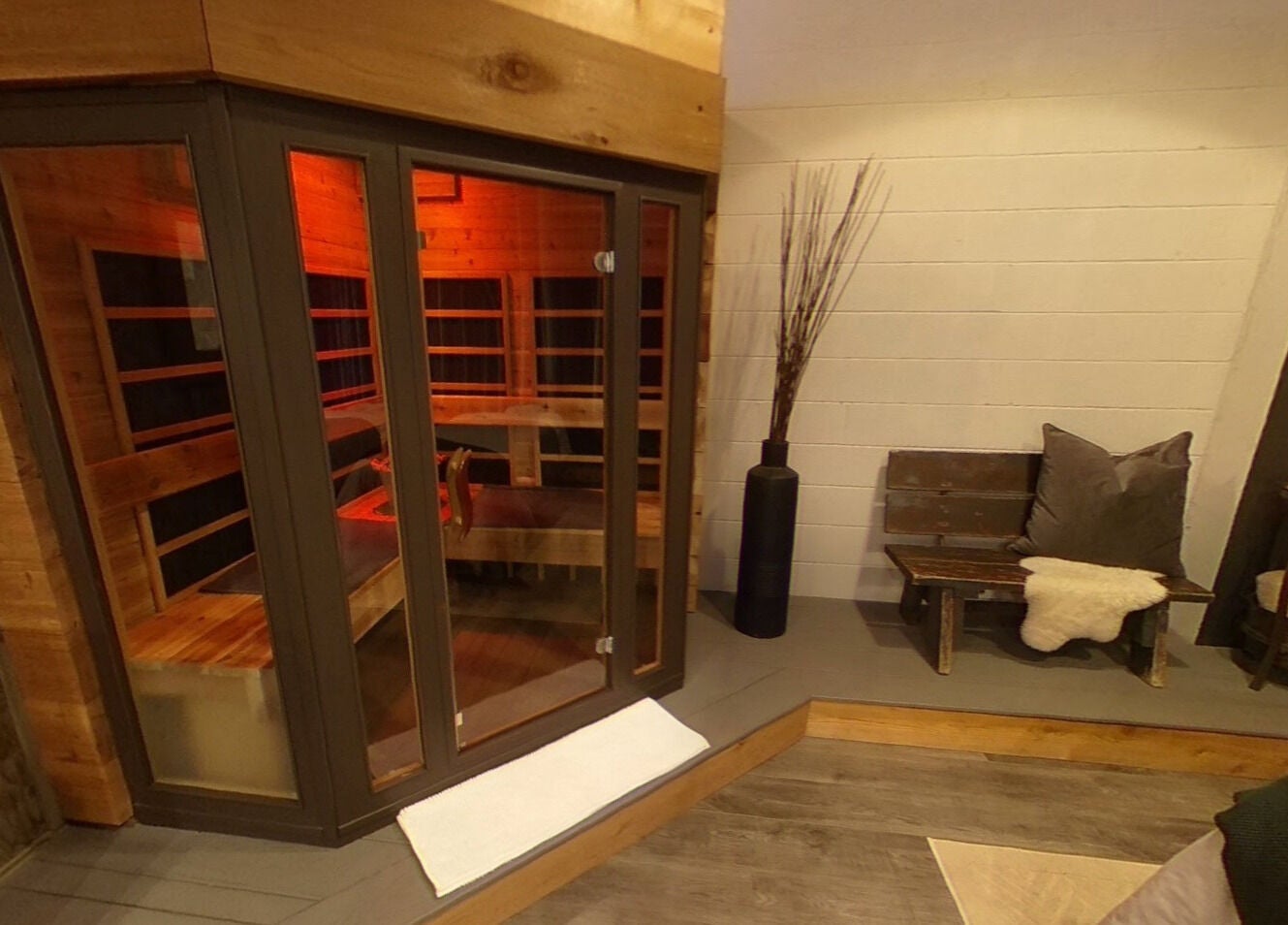 Cozy sauna at Cedar & Sage Co in Banff, Alberta, CA, offering relaxation and wellness.