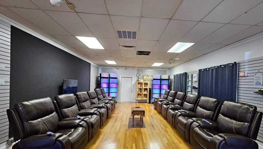 Relax N Recharge (Aurora Healing Ministry) venue in Tarpon Springs, Florida, US with plush seating for relaxation.
