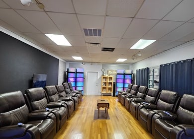 Relax N Recharge (Aurora Healing Ministry) venue in Tarpon Springs, Florida, US with plush seating for relaxation.