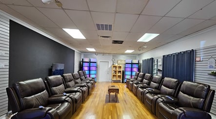 Relax N Recharge (Aurora Healing Ministry) venue in Tarpon Springs, Florida, US with plush seating for relaxation.