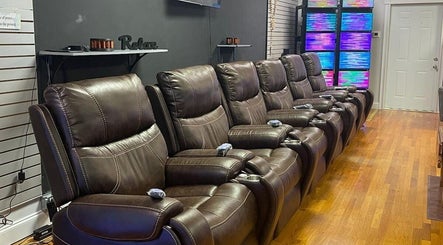 Cozy recliners in Relax N Recharge (Aurora Healing Ministry), Tarpon Springs, Florida, US offer ultimate comfort.