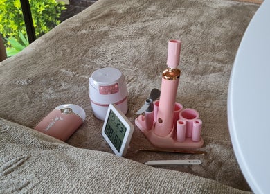 Beauty tools and devices on a plush towel at LavishYou, Durban, Kwazulu-natal, ZA.
