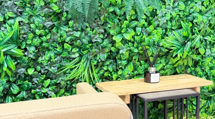 Green foliage decor at Roots & Rituals Salon Inverness, Inverness, Scotland, GB.