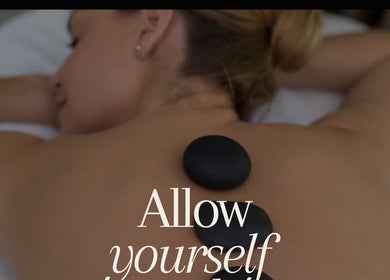 Relaxing hot stone massage at Roots & Rituals Salon Inverness, Inverness, Scotland, GB, promoting wellness and calm.