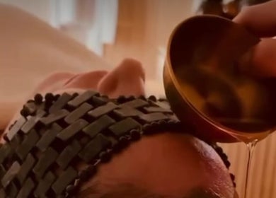 Rejuvenating face massage at The Head Spa Suite, Inverness, Scotland, GB, with warm oil for relaxation.