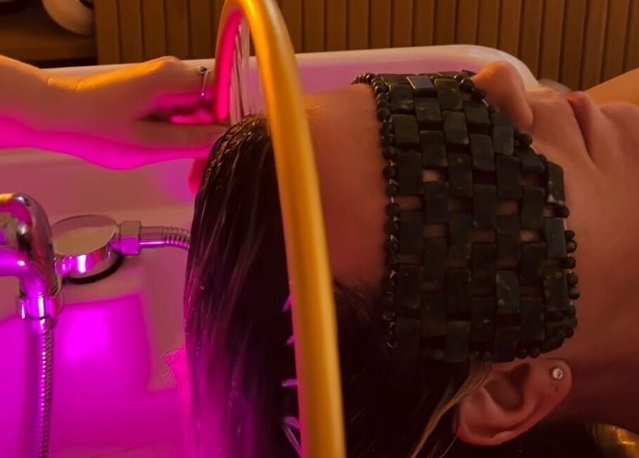 Relaxing head treatment at The Head Spa Suite, Inverness, Scotland, GB with ambient lighting and eye mask.